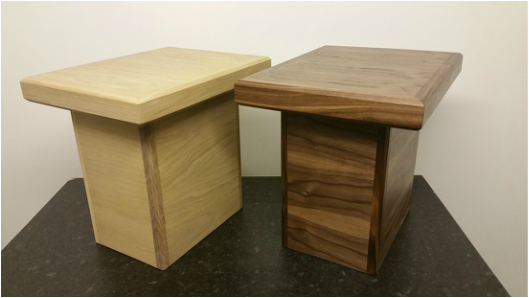 Oak and walnut side tables.
